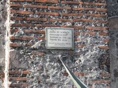 Plaque on remains of Chapultepec Aqueduct in Mexico City with historical information