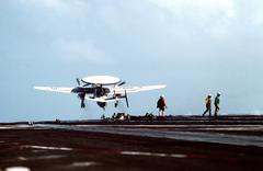 E-2C Hawkeye aircraft launching from USS John F. Kennedy aircraft carrier during Fleet Exercise 1-90