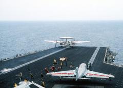 E-2C Hawkeye aircraft launched from USS John F. Kennedy during NATO Exercise DISPLAY DETERMINATION '86 with an EA-6B Prowler in position