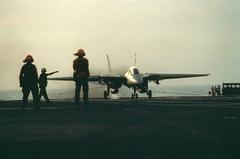 F-14A Tomcat aircraft arresting landing on USS John F. Kennedy aircraft carrier during Fleet Exercise 1-90