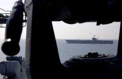 USS John F. Kennedy aircraft carrier being relieved by USS Harry S. Truman in Persian Gulf