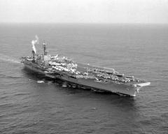 Starboard bow view of the aircraft carrier USS John F. Kennedy (CV-67) underway in the Caribbean Sea