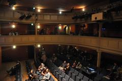 Interior view of the Landsberg am Lech Stadttheater auditorium showing seating and stage