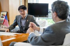 Nara Prefecture Governor Makoto Yamashita reacting during a meeting with U.S. Consul General Jason Cubas