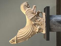 Ancient marble sculpture of a seated figure at Palais Massimo