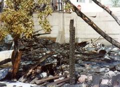 PSA Flight 182 plane crash site aftermath with smoke and wreckage