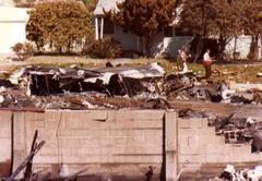 PSA Flight 182 crash site aftermath with emergency responders and wreckage