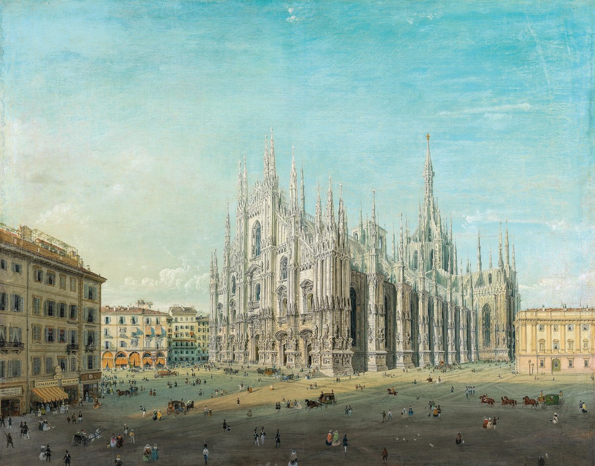 Piazza del Duomo in Milan with historic buildings and people walking