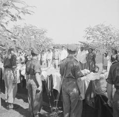Massive reburial ceremony of war victims at Menteng Poeloeh war cemetery in Batavia on April 5, 1948