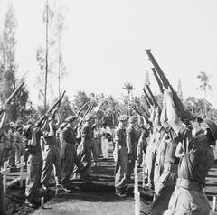 Massive reburial ceremony for war victims at Menteng Poeloeh War Cemetery in Batavia, April 5, 1948