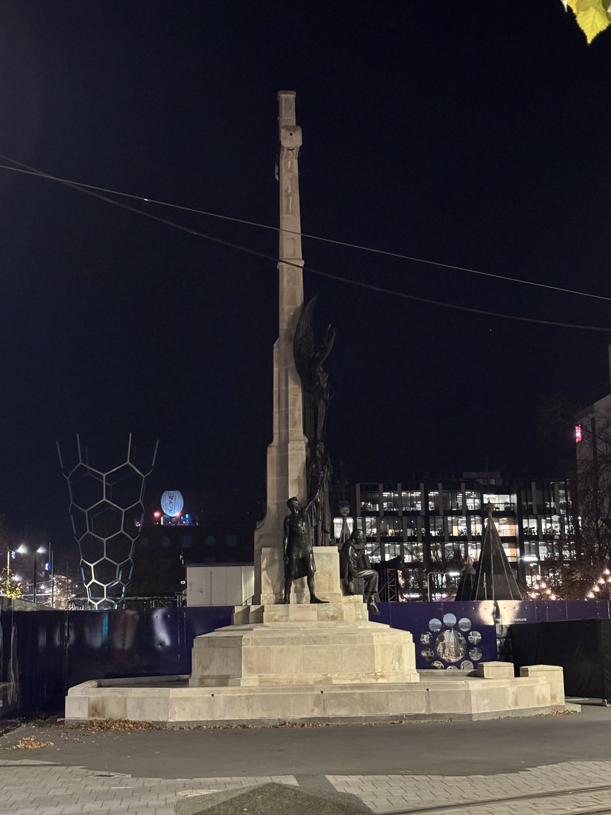Citizens' War Memorial illuminated at night during Christchurch Wikicon 2025 Friday evening photowalk