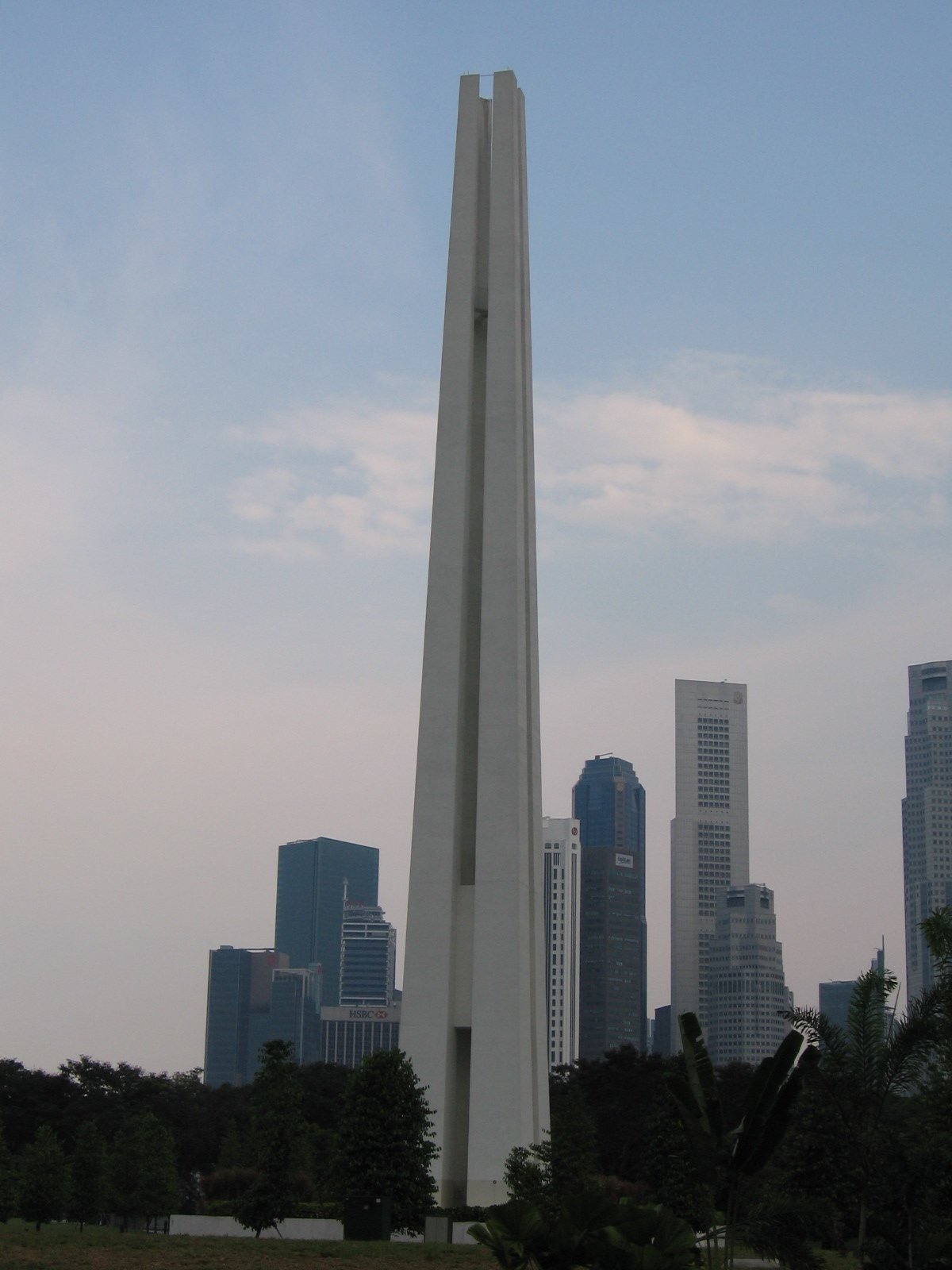 War Memorial Park in Singapore with lush greenery and towering buildings in the background