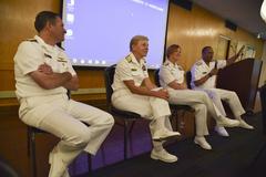 Rear Admirals and Vice Admiral answering questions at Portland school superintendents breakfast