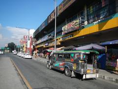 View of Old Capitol Site area with City Mall and PhilCoa footbridge along Commonwealth Avenue in Quezon City