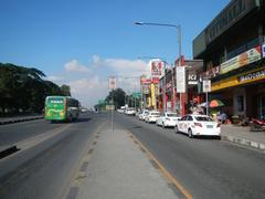 Old Capitol Site in Quezon City with City Mall and PhilCoa footbridge near San Vicente and U.P. Village along Commonwealth Avenue