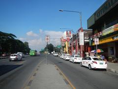 Commonwealth Avenue Old Capitol Site Quezon City with City Mall and PhilCoa footbridge near San Vicente and UP Village Diliman