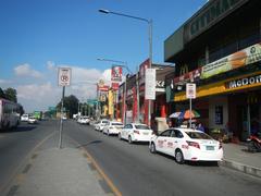 Old Capitol Site and City Mall beside PhilCoa footbridge in Quezon City, Philippines