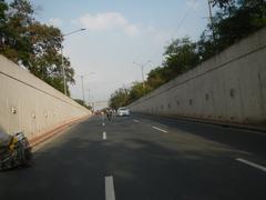 Street view of Batasan Road corner Commonwealth Avenue in Batasan Hills, Quezon City with multi-lane road and vehicles