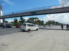 Diliman Doctors Hospital and flood control infrastructure on Commonwealth Avenue, Quezon City, Philippines