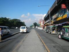 View of Old Capitol Site area with City Mall and PhilCoa footbridge near San Vicente and U.P. Village in Quezon City District 4 along Commonwealth Avenue and Radial Road 6