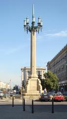 Giant lamp-post in Constitution Square, Warsaw under a cloudy sky