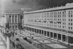 Plac Konstytucji Square in Warsaw, Poland in July 1952 with Stalinist architecture and busy urban life