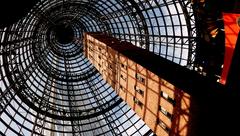 Coop's Shot Tower in Melbourne CBD, historic 50-meter tall red brick tower with conical glass roof of Melbourne Central