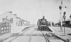 Dunmanway Station in County Cork, Ireland, circa 1898 showing vintage railway architecture and surroundings