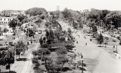 Paseo de la República street in the 1930s with vintage buildings and cars
