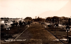 Paseo de la República highway in Lima Peru with trees and buildings on both sides under a cloudy sky