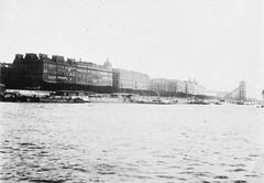 Pesti hotel row viewed from the Danube river with the under-construction Erzsébet Bridge in the background