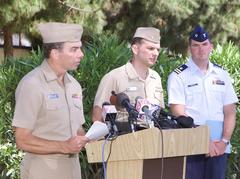 Captain Bruce Smith answering questions during a press conference about USS Dolphin fire and flooding incident