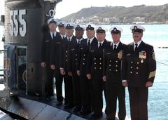 Chief petty officers celebrating change of command ceremony aboard USS Dolphin submarine