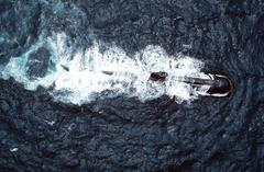 Aerial starboard view of the submarine USS Dolphin AGSS-555 underway off Southern California coast