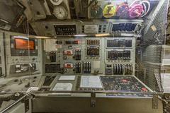 Close-up view of USS Dolphin AGSS-555 submarine control panel with detailed instruments and gauges