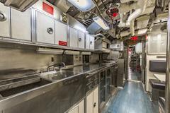 USS Dolphin submarine interior showing mess area and starboard side sink