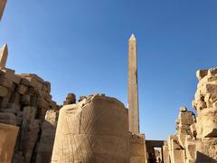 Central Crossing at Karnak Temple in Luxor Egypt showing ancient Egyptian architecture and sphinx statues along the ceremonial pathway under daylight
