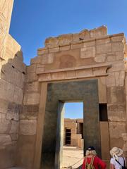 Wide view of the ancient Karnak Temple complex with towering columns and ruins at Luxor, Egypt