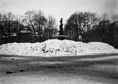 Havis Amanda statue surrounded by snowdrifts, black and white negative nitrate photograph
