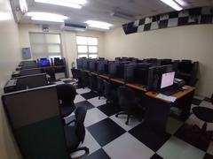 Fisheye view of Room 203 computer lab in the Information and Communications Technology Center at De La Salle University – Dasmariñas with 30 desktop computers