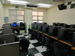 Computer lab with 30 desktop computers in room 203 of the Information and Communications Technology Center at De La Salle University – Dasmariñas