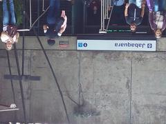 Entrance of Jabaquara station with stairs and people walking