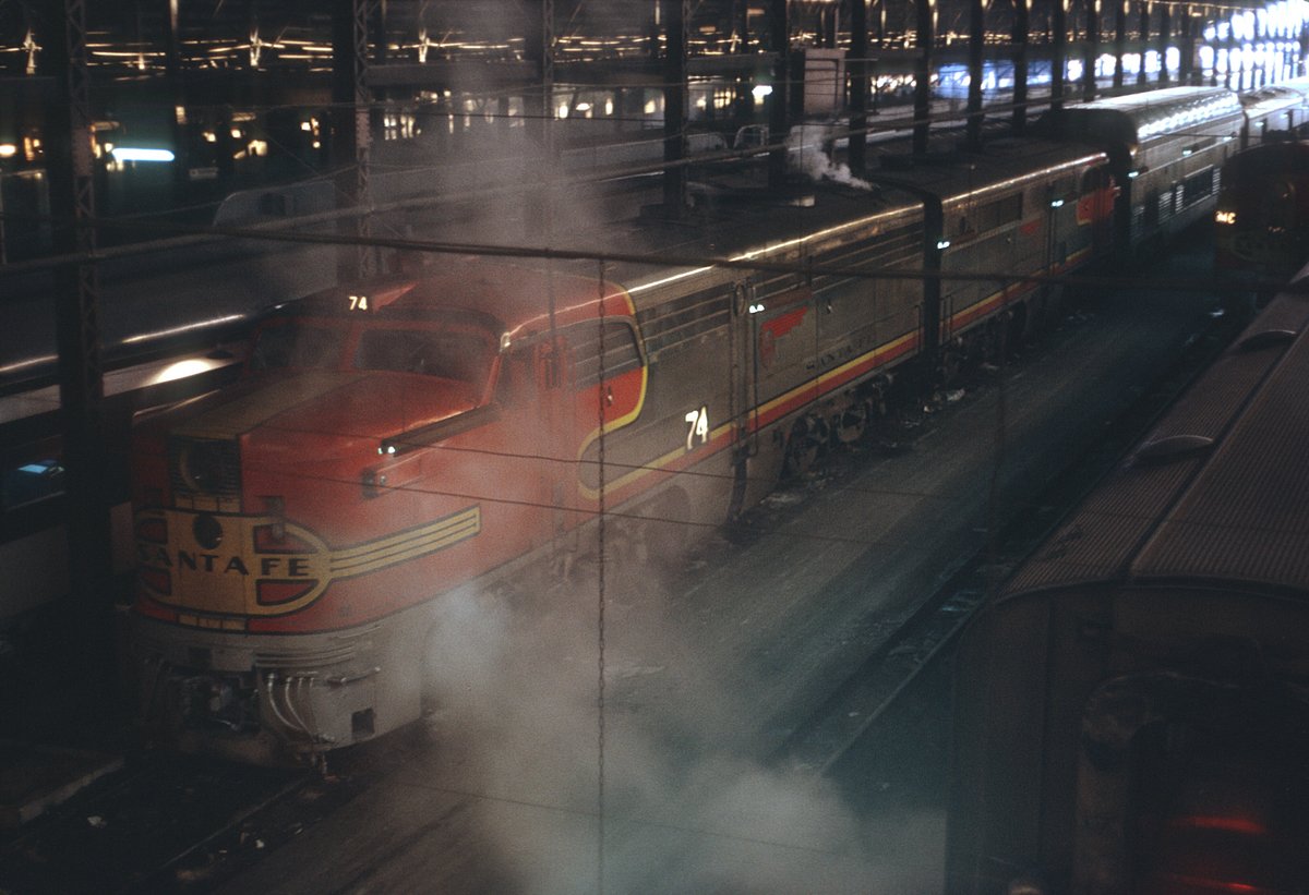 AT&SF PA-1 74L dome lounge car, baggage car, and two other cars standing at Dearborn Station Chicago