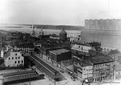 Vintage view of Le Vieux-Montréal and Rue Le Royer from La Sauvegarde building in 1915 with Grain Elevator No. 2 in background