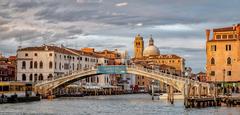 Ponte degli Scalzi bridge over Grand Canal in Venice during sunset