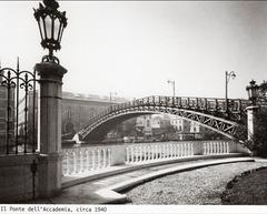 Ponte Accademia bridge in Venice in 1940 with vintage cars and pedestrians