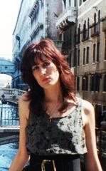 Woman wearing green top in Venice