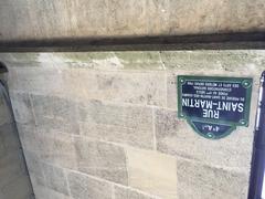 Street plaque for Saint Martin Street on the Saint-Merri Church in Paris