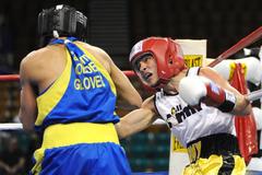 U.S. Army Spc. Adrian Ghisoiu delivering a right uppercut in 112-pound semifinals of 2009 U.S. National Boxing Championships