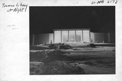 Truman Library illuminated at night with clear sky
